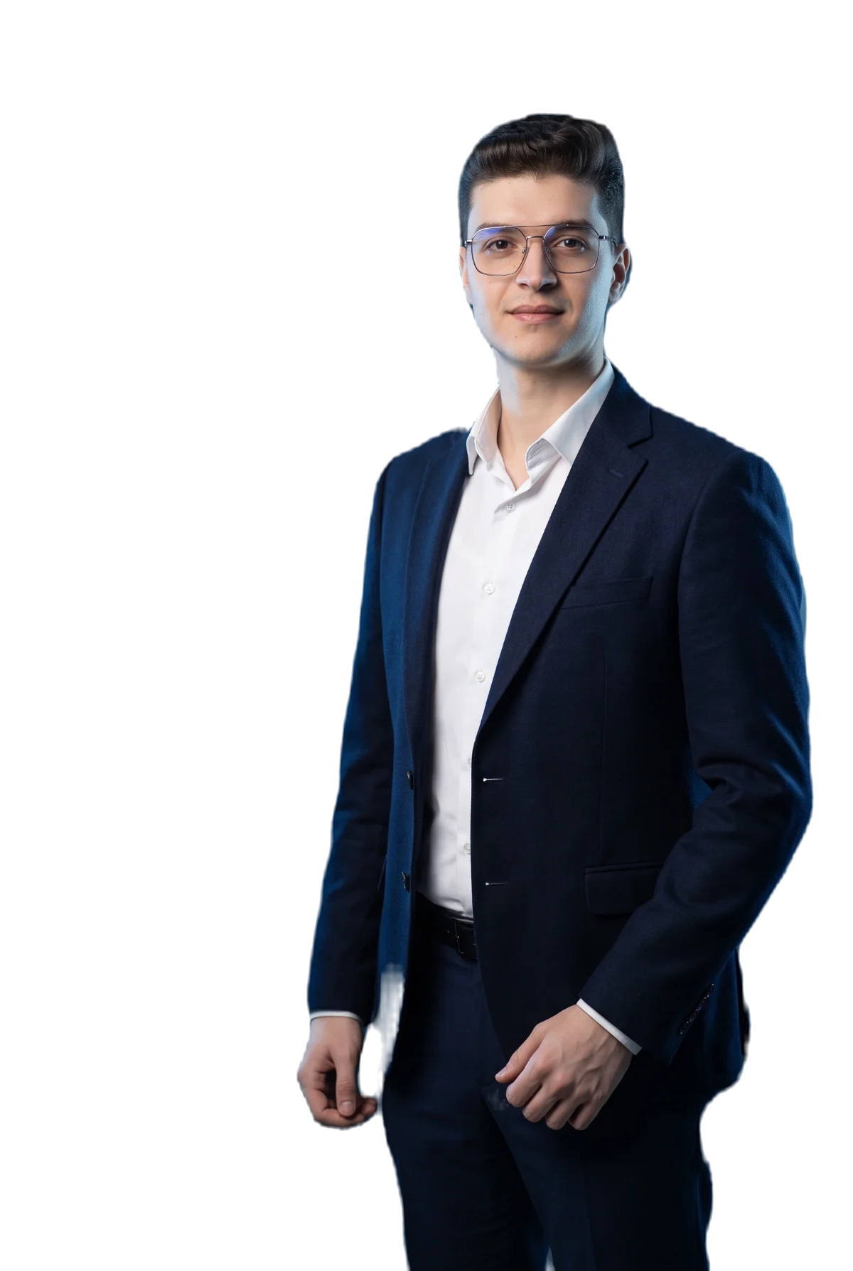 Youssef Farhat standing in a navy suit